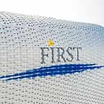 At Im First Lägenhet
